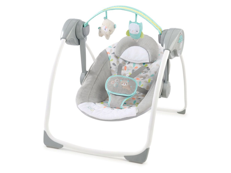 Une balancelle pour bébé avec un revêtement gris et un imprimé d'animaux bleu et vert.