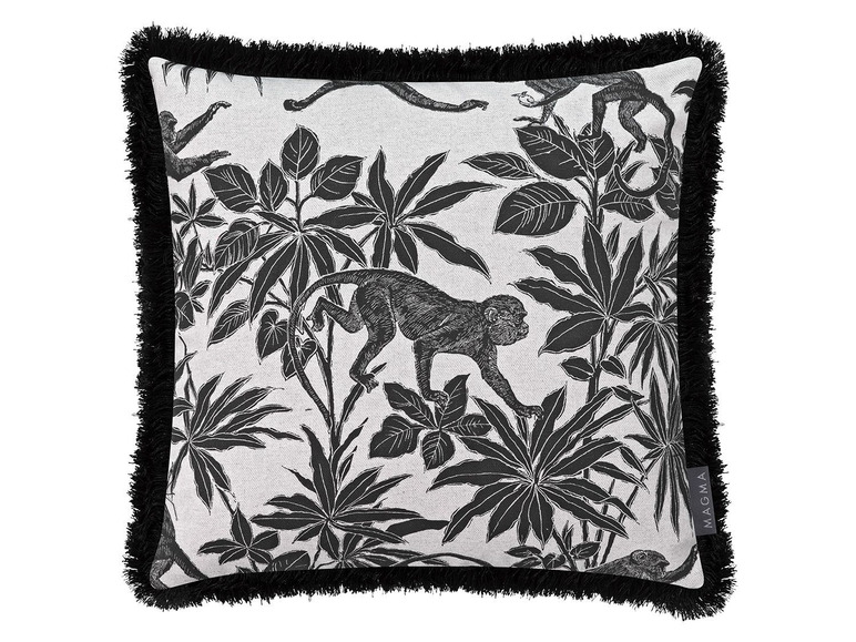 Kussen met zwarte apen en palmbladeren print, met zwarte franjes.