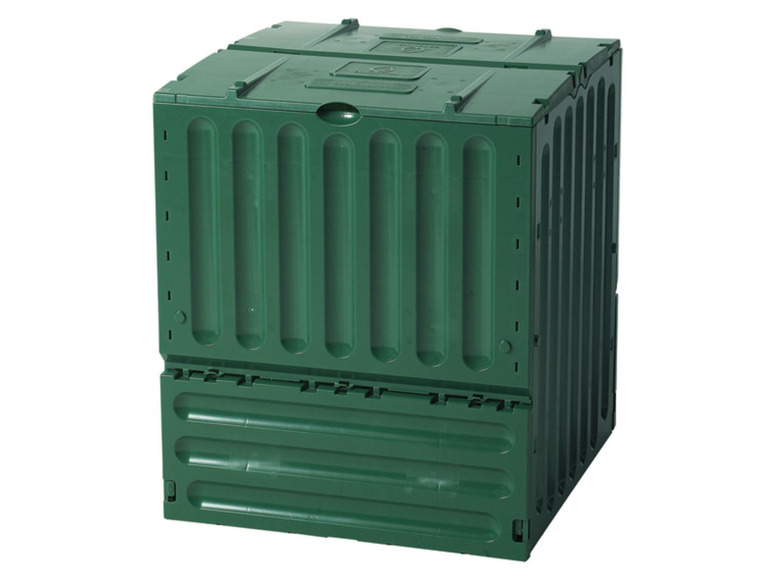 Een groene plastic composthoop.
