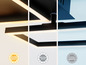 Zwarte plafondlamp met LED-verlichting in warm, neutraal en koud wit.