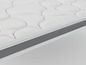 Un matelas blanc avec une bordure grise.