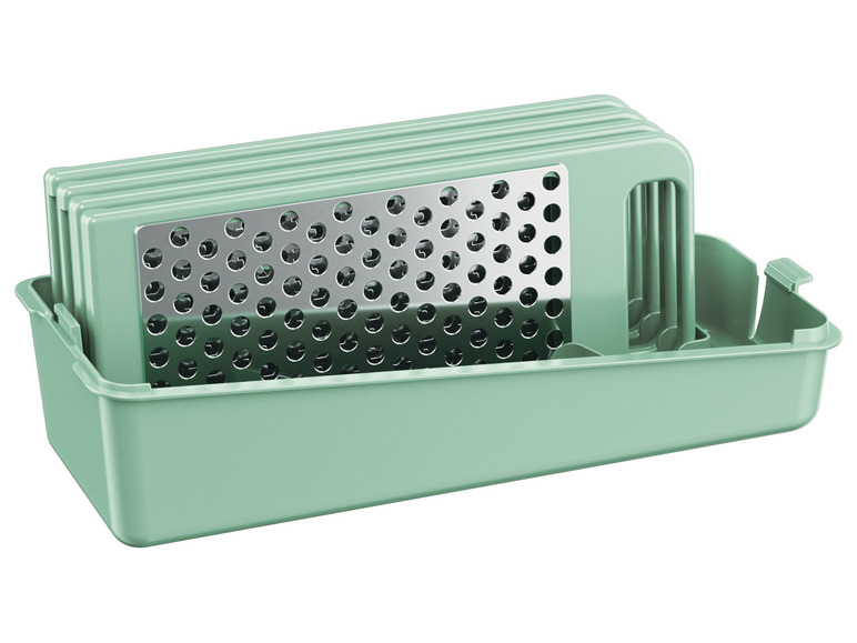 Groene opbergdoos met verschillende raspen.