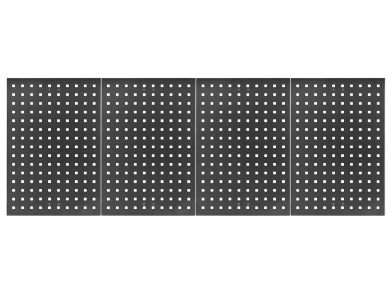 Vier zwarte pegboards met gaten voor gereedschap.