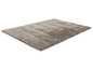 Tapis beige à texture douce.