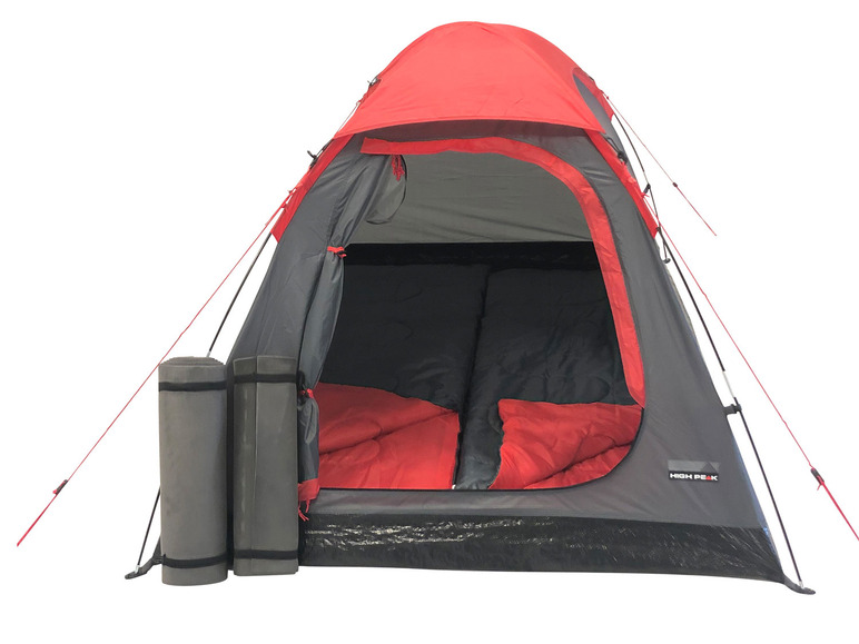 Une tente High Peak rouge avec des matelas de sol.