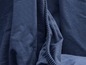 Close-up van blauwe katoenen stof.