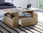 Une table basse en bois avec un tiroir, des rangements et une tablette.