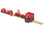Ensemble de jouets de pompiers avec train, tunnel et caserne.