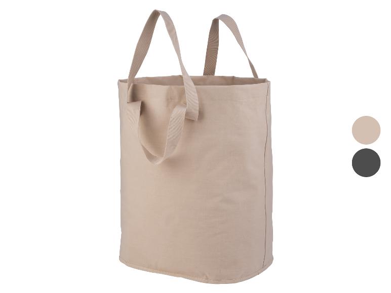 Sacs en toile beige et noir pour rangement.