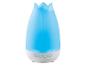 Diffuseur d'huiles essentielles bleu en forme de fleur avec boutons en bas.