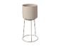 Pot de fleurs beige avec support en métal