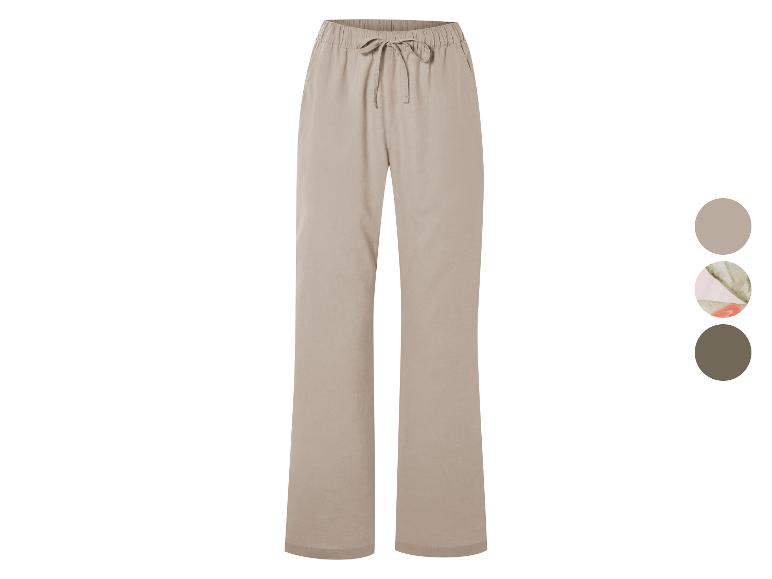 Pantalon ample beige avec cordon de serrage.