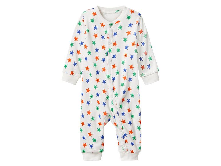 Une grenouillère bébé à manches longues avec un imprimé étoiles colorées.