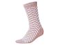 Beige sok met wit zigzagpatroon.