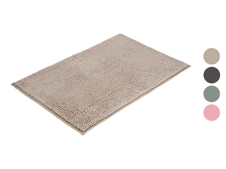 Tapis de bain beige à texture bouclée avec palette de couleurs.