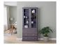 Meuble vitrine en bois avec trois tiroirs, gris foncé avec poignées cuivrées.
