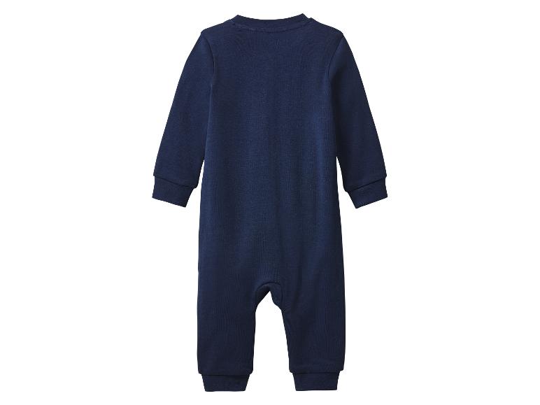Une grenouillère bébé bleu marine à manches longues.