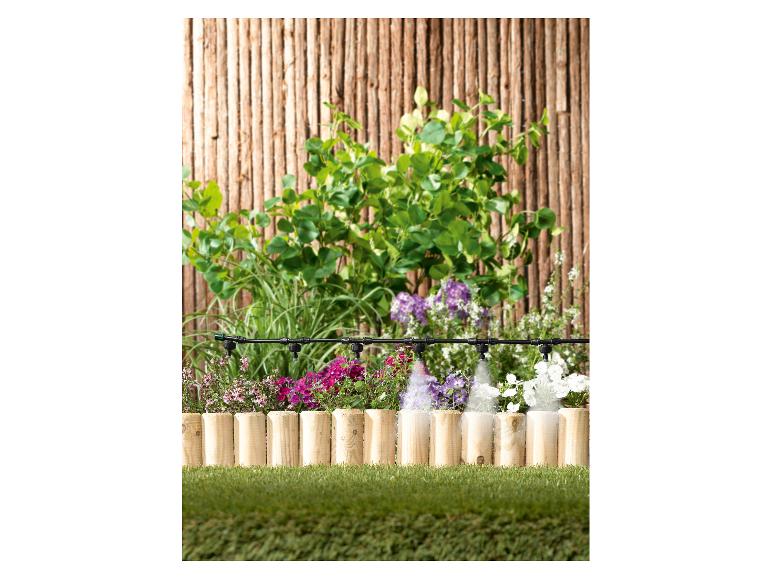 Urn voor buiten in de vorm van een natuursteen kiezel