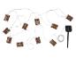 Guirlande lumineuse solaire avec abat-jour style bambou et piquet de terre.