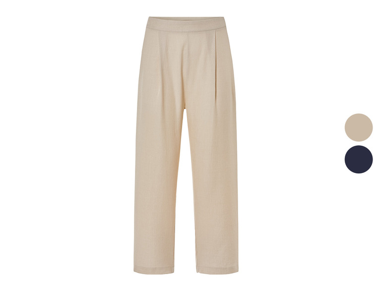 Pantalon beige à plis.