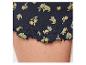 Shorts en jersey noir à volants, motif citron.