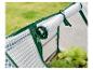 Groene minikas met transparante hoes open geritst en opgerold