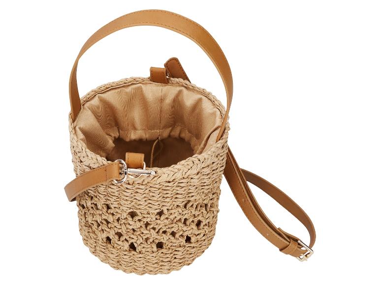 Sac seau en paille avec anse et bandoulière en cuir marron, doublure intérieure en tissu.