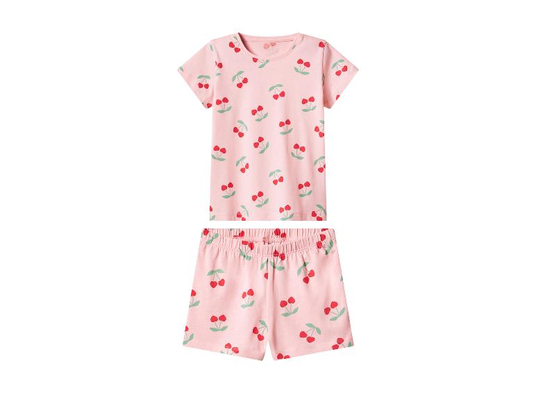 Pyjama rose à motif cerises, composé d'un t-shirt et d'un short.