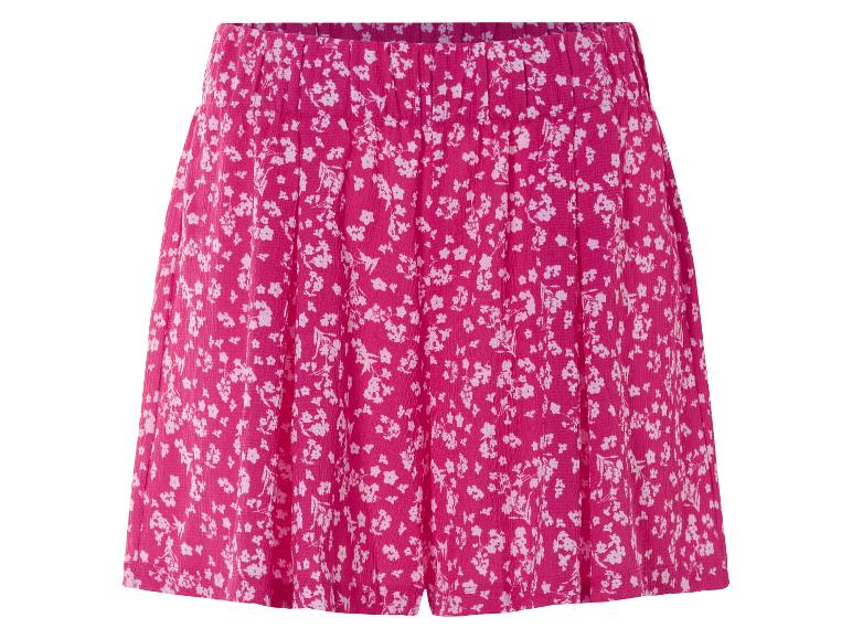 Roze, geplooide shorts met bloemenprint.