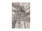 Tapis moderne à motif d'arbres, tons beige et gris.