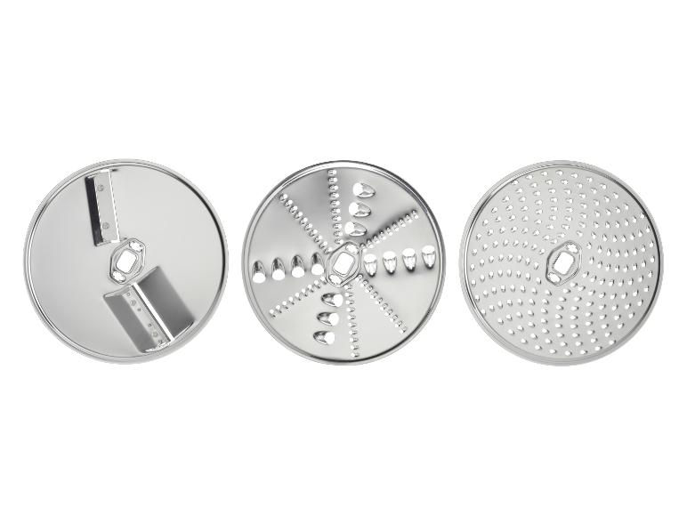 Trois disques métalliques à trancher et râper pour un robot culinaire.