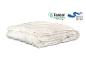Couette blanche matelassée avec logos Tencel et Made in EU.