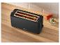 Zwarte SilverCrest broodrooster met toast, tomaten en spread op houten aanrecht.