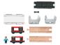 Speelgoedset met trein, houten rails, figuren en accessoires.