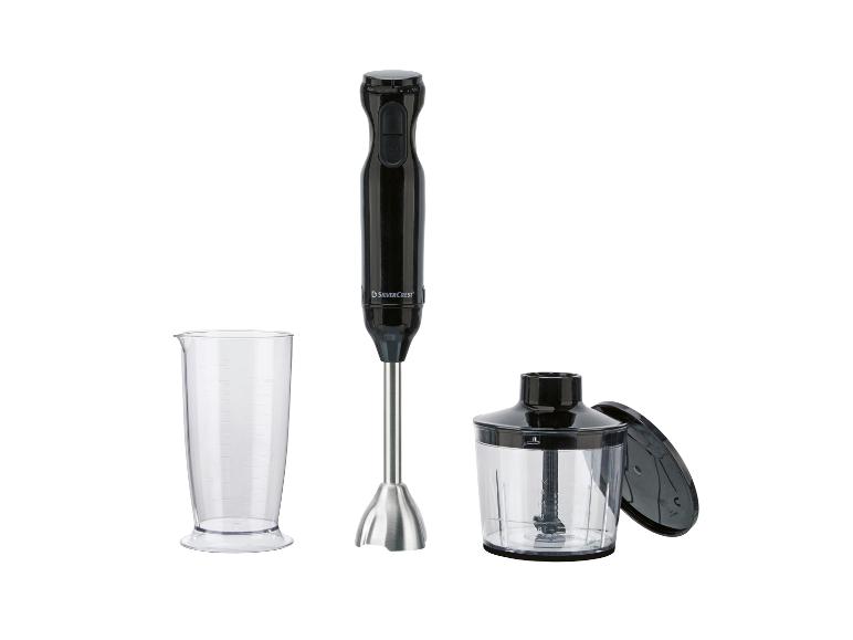 Mixeur plongeant noir avec verre doseur et hachoir sur fond blanc.