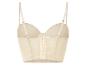 Un soutien-gorge beige avec armatures et bretelles réglables.