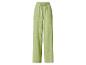Pantalon large en mousseline verte avec cordon de serrage à la taille.