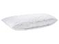 Oreiller blanc avec housse de protection ouverte, montrant le rembourrage intérieur.