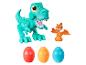 Een groene Tyrannosaurus Rex, een oranje Pterodactyl en drie Play-Doh eieren.