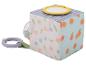 Cube d'activités pour bébé avec miroir, motifs floraux et d'oranges, et anneau de dentition.
