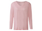 Een roze longsleeve met de tekst 'Focus on the good'.
