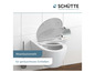 Een witte toiletbril met soft-close functie van Schütte.