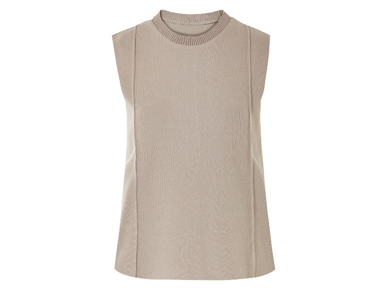 Gilet en tricot beige sans manches.