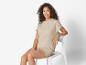 Beige top en bijpassend short.