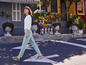 Een vrouw loopt in een wit shirt, blauwe spijkerbroek en groene sneakers op straat.