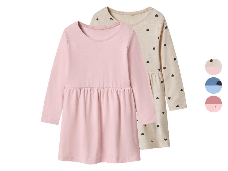 Robes de fille à manches longues, une rose unie et une beige à cœurs noirs.
