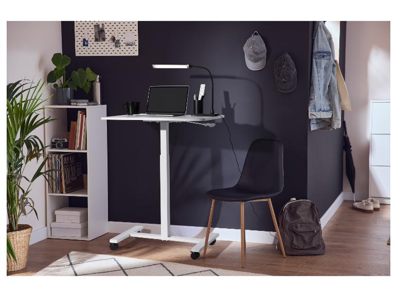Table réglable en hauteur LIVARNO home dans un bureau moderne.