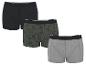 Driepak katoenen boxershorts voor heren: één zwart, één met palmbomenprint en één grijs.