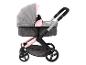 Een roze en grijze kinderwagen met een opdruk van een eenhoorn.