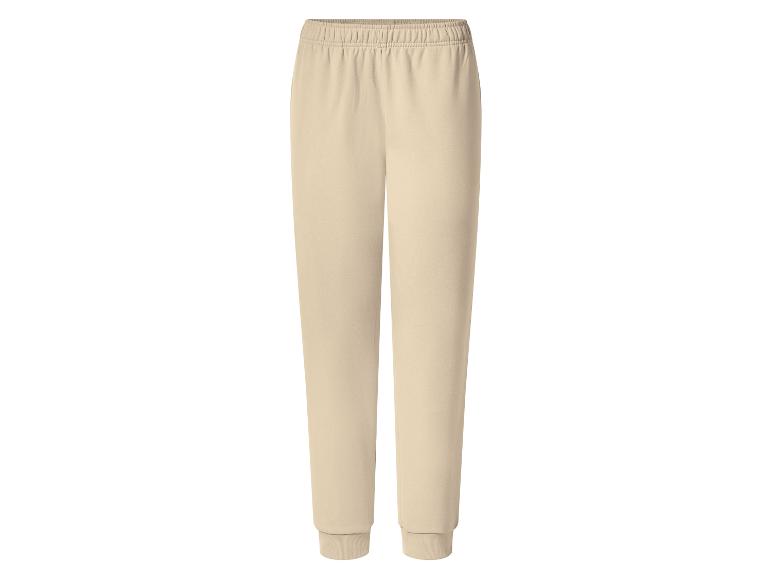 Beige joggingbroek met elastische tailleband en geribde boorden.